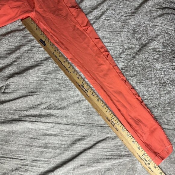 Lululemon Rise and Flow Pant Mesh Criss Cross Size 4 Orange Coral EUC - Picture 4 of 10